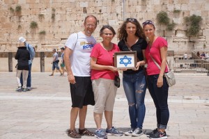 We visited the Western Wall twice. Once during mid-day wit light crowds and then again on Shabbat when young Jews danced and celebrated as they ushered in their day of rest. Here, we are pictured holding a Star of David that Anita's late mother made and framed in the 80s while Anita lived and worked in Israel.